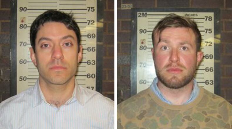 In this combination of two photos provided by the Port Authority of New York and New Jersey Police Department, Cable News Network producers Yon Pomrenze, left, and Connor Fieldman Boals, are shown after their arrests on Tuesday, March 25, 2014. Both men have been charged with criminal trespass, obstruction of governmental administration and disorderly conduct after trying to forcibly push their way through a controlled gate at the World Trade Center Construction site in New York City. A spokeswoman for CNN said the men were in the area to do a story about the recent security breaches and were not asked to sneak onto the site. (AP Photo/Port Authority of New York and New Jersey) In this combination of two photos provided by the Port Authority of New York and New Jersey Police Department, Cable News Network producers Yon Pomrenze, left, and Connor Fieldman Boals, are shown after their arrests on Tuesday, March 25, 2014. Both men have been charged with criminal trespass, obstruction of governmental administration and disorderly conduct after trying to forcibly push their way through a controlled gate at the World Trade Center Construction site in New York City. A spokeswoman for CNN said the men were in the area to do a story about the recent security breaches and were not asked to sneak onto the site. (AP Photo/Port Authority of New York and New Jersey)