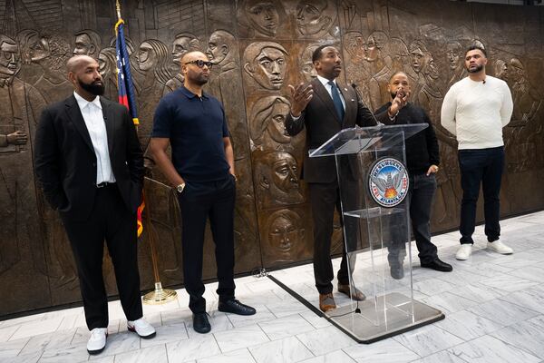 Troy Millings, Rashad Bilal, Mayor Andre Dickens, Matthew Garland, and Michael MacDonald announce the details for Atlanta's fourth annual Invest Fest, at Atlanta City Hall on Friday, March 22, 2024. (Olivia Bowdoin for the AJC).