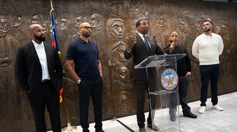 Troy Millings, Rashad Bilal, Mayor Andre Dickens, Matthew Garland, and Michael MacDonald announce the details for Atlanta's fourth annual Invest Fest at Atlanta City Hall on Friday, March 22, 2024. (Olivia Bowdoin for the AJC)