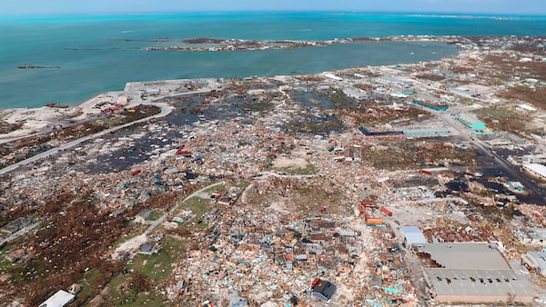 The destruction caused by Hurricane Dorian is seen from the air, in Marsh Harbor, Abaco Island, Bahamas, Wednesday, Sept. 4, 2019. The death toll from Hurricane Dorian has climbed to 20. Bahamian Health Minister Duane Sands released the figure Wednesday evening and warned that more fatalities were likely. (AP Photo/Gonzalo Gaudenzi)