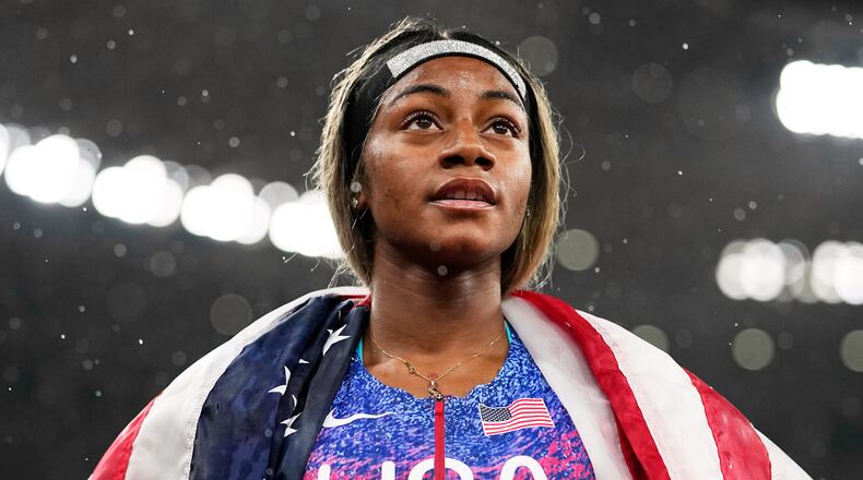 FILE - United States' Sha'Carri Richardson looks on after winning the gold medal in the women's 4 X 100 meters relay at the World Athletics Championships in Tokyo, Sept. 21, 2025. (AP Photo/Matthias Schrader, File)
