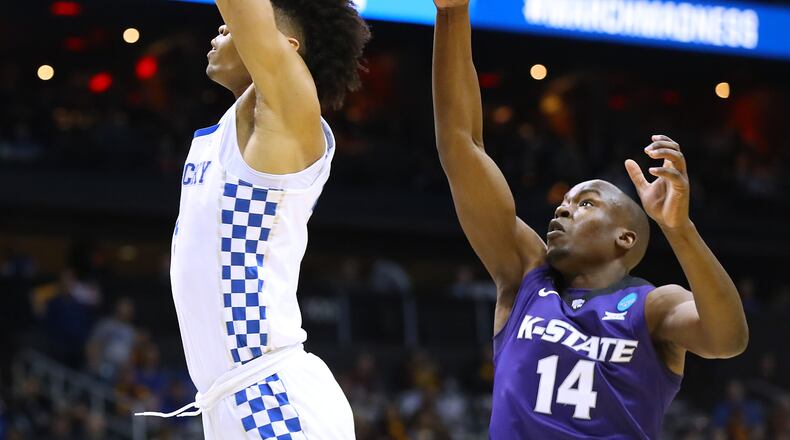 March 22, 2018 Atlanta: Kansas State forward Makol Mawien blocks a shot by Kentucky forward Nick Richards during the first half in a regional semifinal NCAA college basketball game on Thursday, March 22, 2018, in Atlanta.  Curtis Compton/ccompton@ajc.com