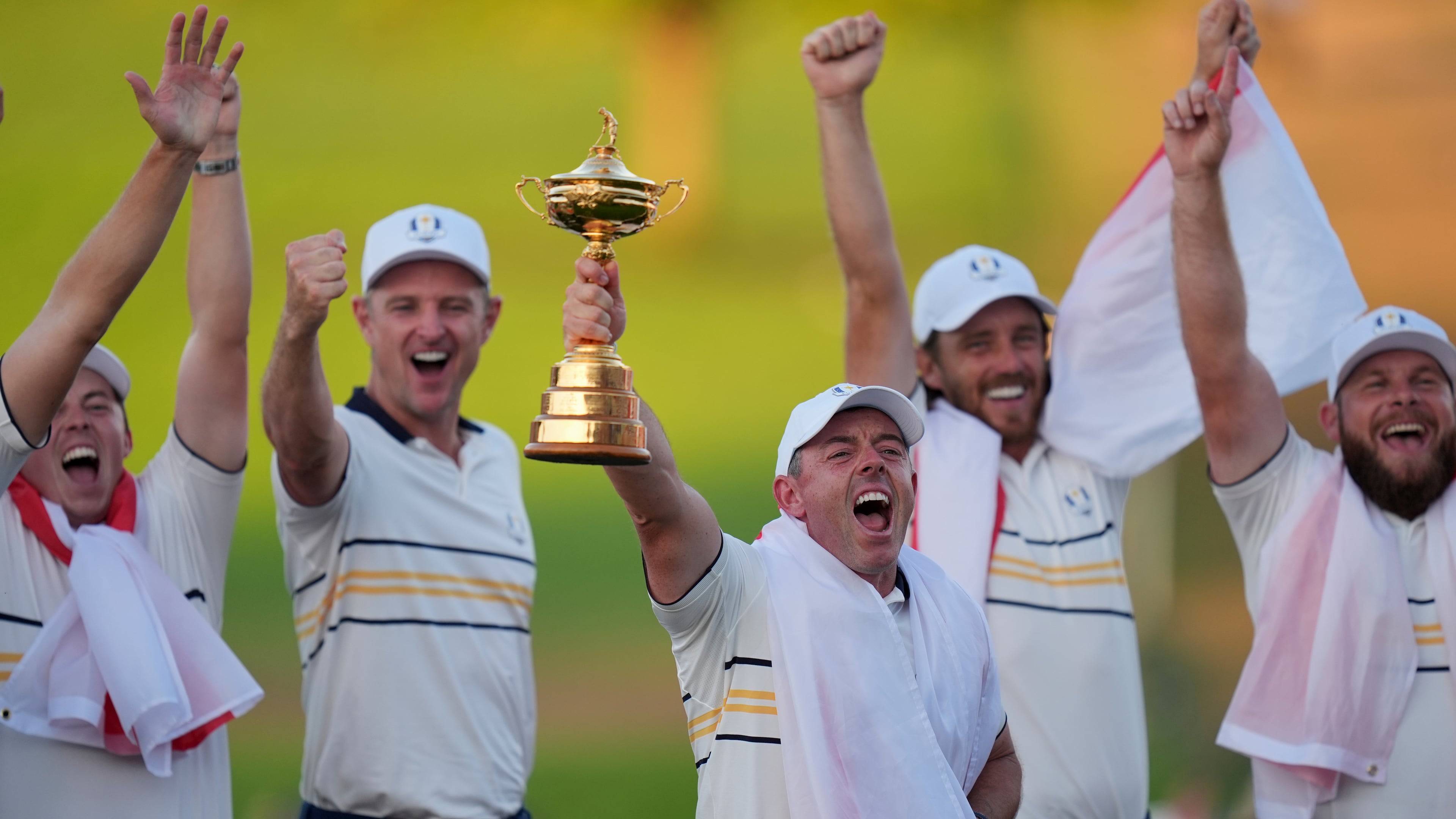 Europe's Rory McIlroy poses with the trophy after winning the Ryder Cup golf tournament against the United States on the Bethpage Black golf course, Sunday, Sept. 28, 2025, in Farmingdale, N.Y. (AP Photo/Seth Wenig)
