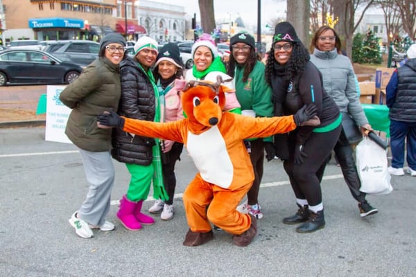 The Dashing Through the Square 5K Run/Walk, a qualifier for The Atlanta Journal-Constitution Peachtree Road Race, takes place Saturday in Marietta. (Courtesy of Big Peach Running Co.)