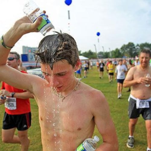There have been six years where the Peachtree Road Race began in heat greater than 80 degrees, but each of those began at 8 a.m or later. (Jason Getz/AJC file 2019)
