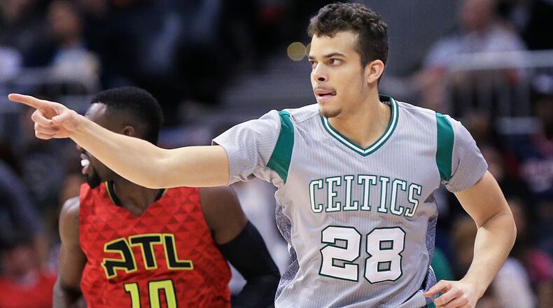 Celtics guard R.J. Hunter points to a teammate after he scored against the Hawks on a good pass in a basketball game on Tuesday, Nov. 24, 2015, in Atlanta. Curtis Compton / ccompton@ajc.com