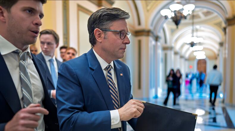 Speaker of the House Mike Johnson, R-La., leaves the chamber as members debate a series of measures including a continuing resolution to fund the government and a spending package for the Iran war, at the Capitol in Washington, Tuesday, July 21, 2026. (AP Photo/J. Scott Applewhite)