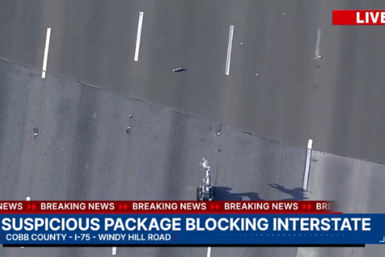 A portion of I-75 in Cobb County was closed Friday afternoon while a robotic device checked on a "suspicious item." (Courtesy of Channel 2 Action News)
