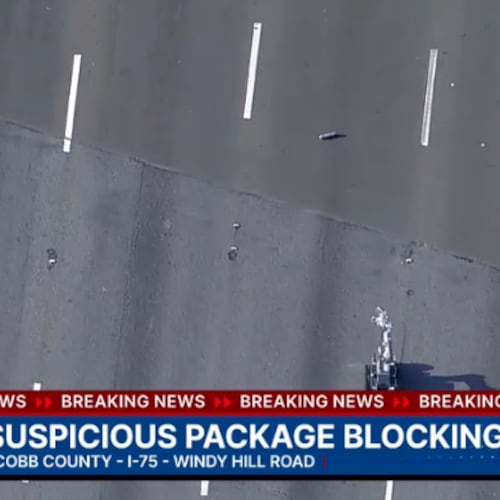 A portion of I-75 in Cobb County was closed Friday afternoon while a robotic device checked on a "suspicious item." (Courtesy of Channel 2 Action News)