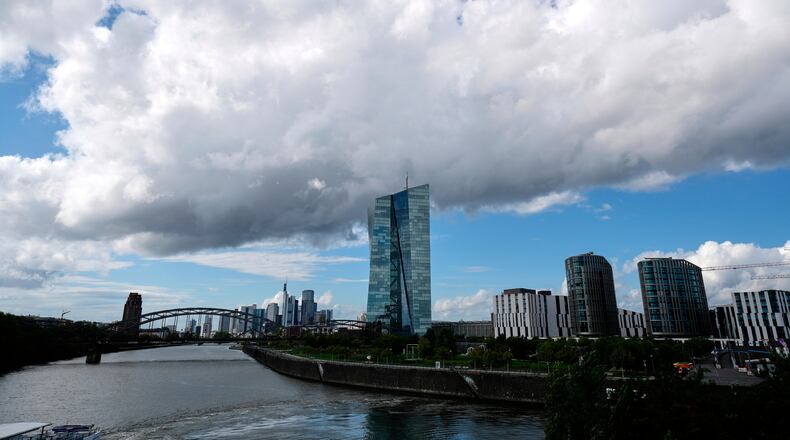 FILE -Clouds cover the sky over the headquarters of the European Central Bank in Frankfurt, Germany, Sept. 11, 2025. (AP Photo/Michael Probst, File)
