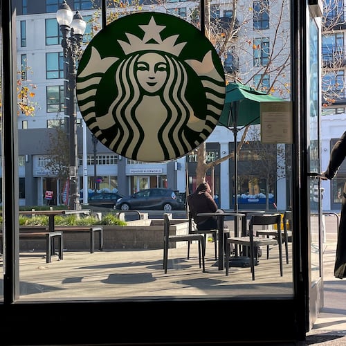 FILE - A costumer exits a Starbucks store in Oakland, Calif., Thursday, Jan. 16, 2025. (AP Photo/Godofredo A. Vásquez, File)