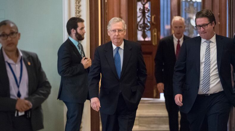 Like Senate Majority Leader Mitch McConnell on Thursday night, tax reform marches on in Congress. (AP Photo / J. Scott Applewhite)