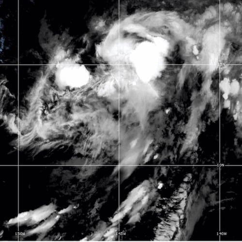 This NOAA satellite image taken at 11:04 a.m. EST on Thursday, Aug. 13, 2026, shows Tropical Storm Lala in the Pacific Ocean. (NOAA via AP)
