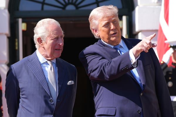 Britain’s King Charles III (left) and U.S. President Donald Trump speak at the White House on Monday. (Alex Brandon/AP)