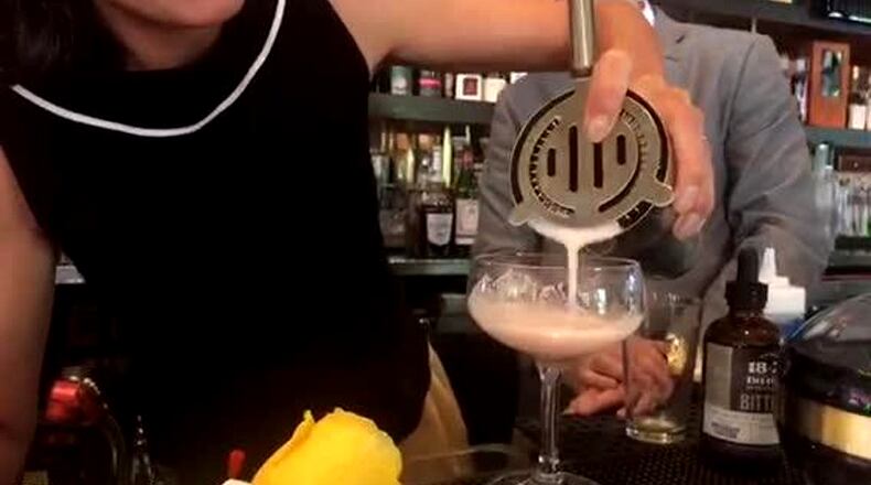 Alpharetta residents may get to vote Nov. 6 on earlier alcohol serving hours Sundays. AJC FILE