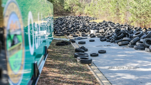 Several warrants have been issued for the arrest of Donald Leverette. Union City police say he dumped more than 1,000 tires behind one subdivision. JOHN SPINK / JSPINK@AJC.COM
