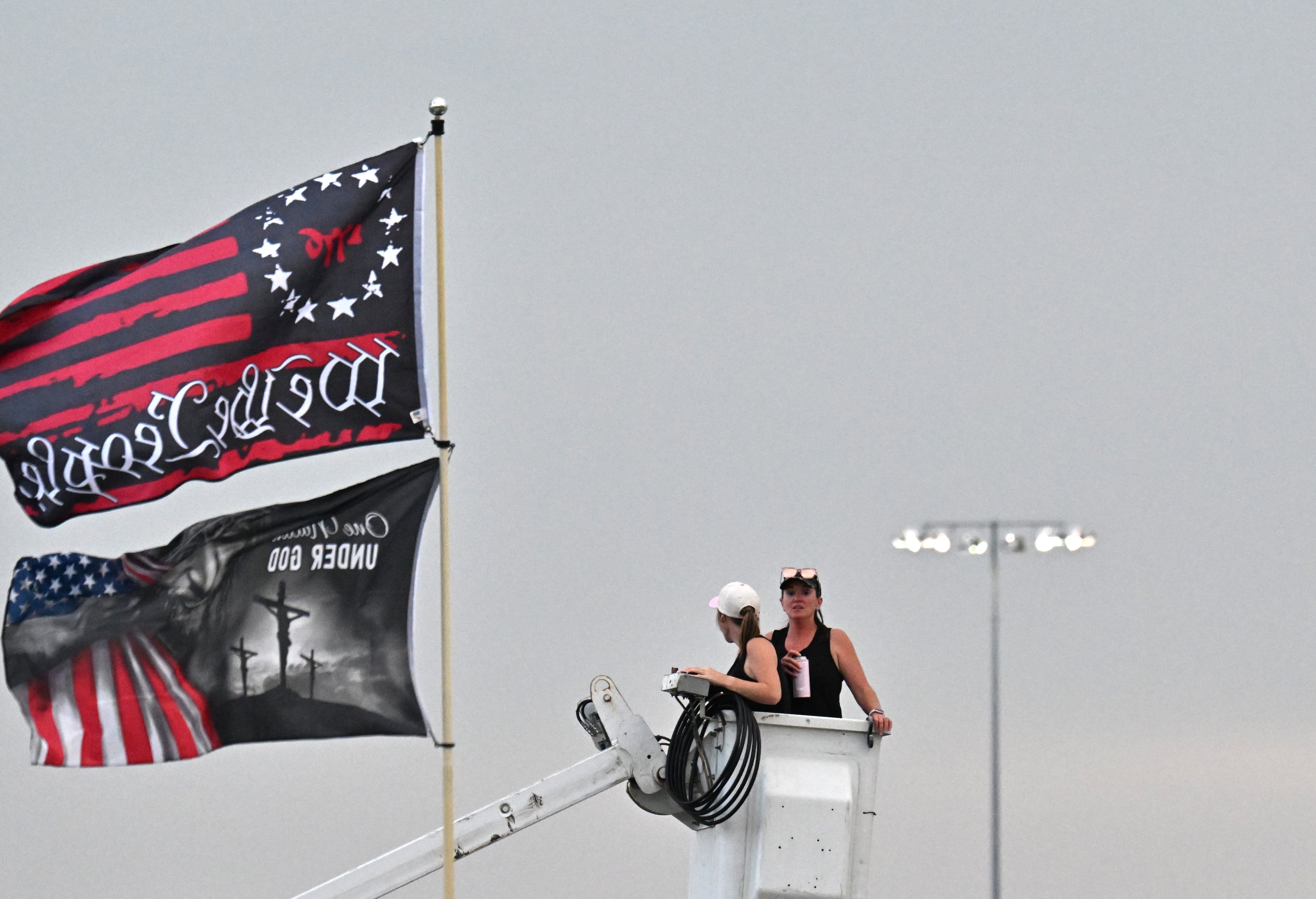 NASCAR fans watch the start of Quaker State 400 NASCAR Cup Series race at EchoPark Speedway, Saturday, June 28, 2025, in Hampton. (Hyosub Shin / AJC)