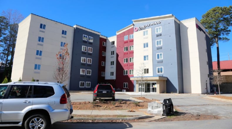 The Candlewood Suites Hotel on Corporate Plaza in Smyrna was under construction when owner Nilesh "Neal" Patel and a plumber were seriously burned in a natural gas explosion inside a fifth floor maintenance room in November 2022. Patel died 10 weeks later as a result of his injuries, his wife says in a lawsuit that seeks to hold Atlanta gas companies liable. Dina Patel's lawsuit, which includes this photograph of the hotel in November 2022, asks for more than $7 million in damages.