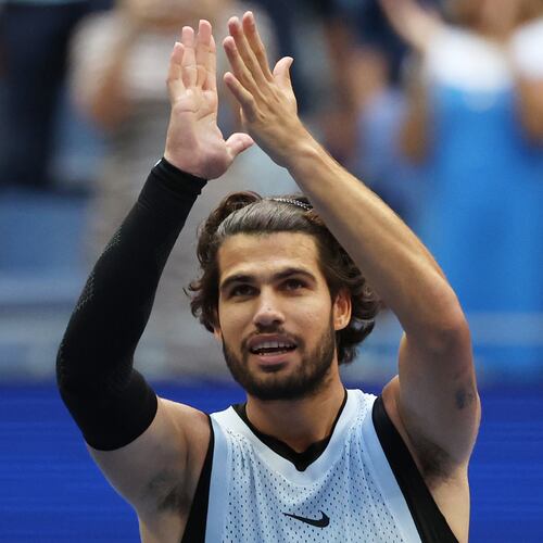 Carlos Alcaraz, of Spain, gestures after he won his match against Tommy Paul, of the United States, during the fourth round of the U.S. Open tennis championships Sunday, Sept. 6, 2026, in New York. (AP Photo/Heather Khalifa)