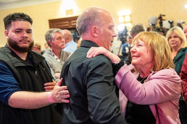Wisconsin Supreme Court candidate Brad Schimel talks with supporters after making his concession speech Tuesday, April 1, 2025, in Pewaukee, Wis. (AP Photo/Andy Manis)
