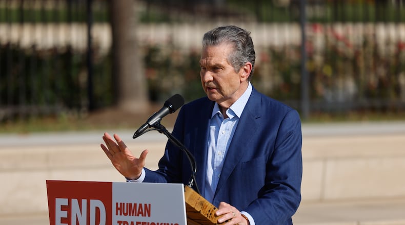 Republican nominee for governor Rick Jackson — seen here at a news conference in Atlanta last week — said Tuesday that his administration would seek to broaden Medicaid coverage while preserving work requirements for some recipients. (Arvin Temkar/AJC)