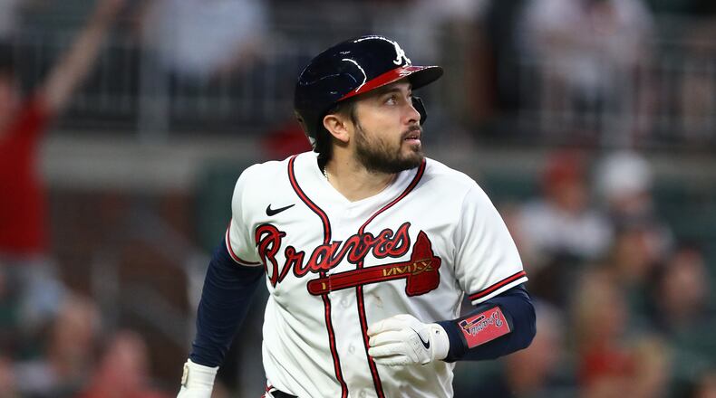 Braves catcher Travis d'Arnaud watches his 2-run homer leave the park as he rounds the bases against the Boston Red Sox.    “Curtis Compton / Curtis.Compton@ajc.com”