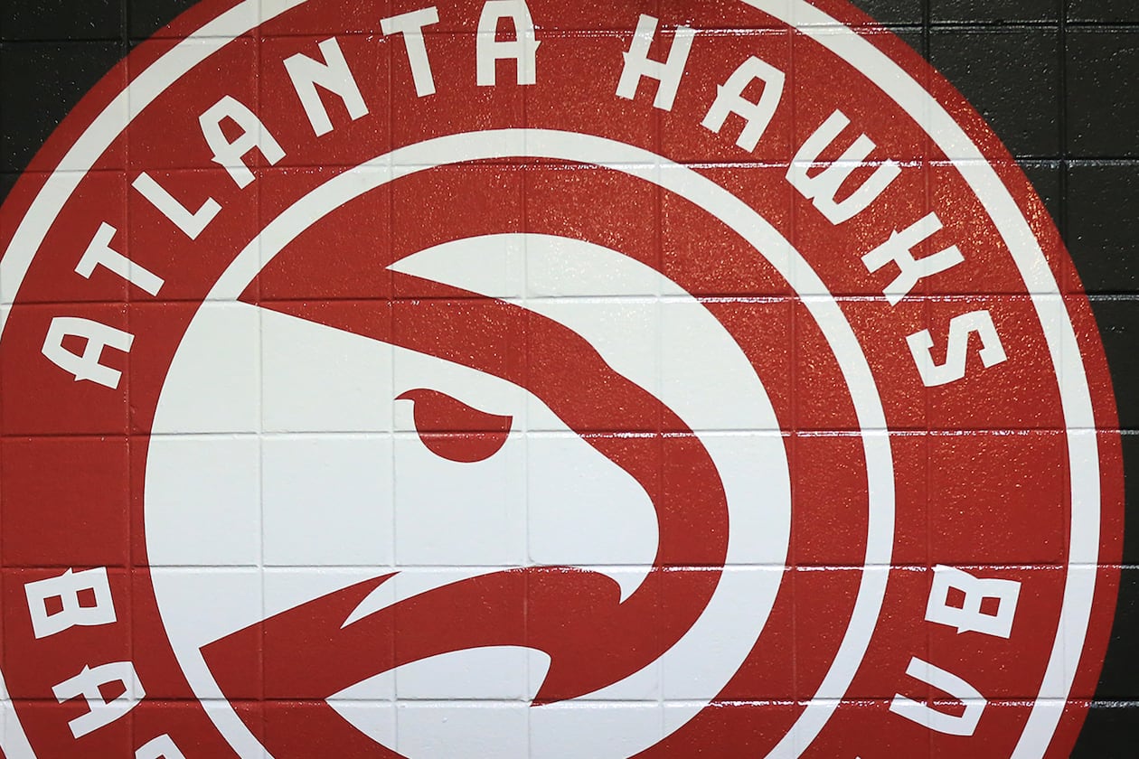 A Hawks logo painted on the tunnel wall leading out to the court on Tuesday, Oct. 27, 2015, in Atlanta. (Curtis Compton/AJC)