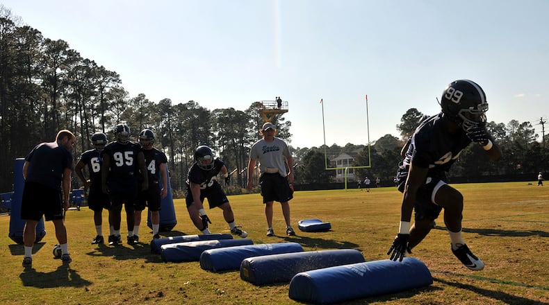 Defensive linemen run drills during Georgia Southern's spring football practice March 13 in Statesboro, Ga.