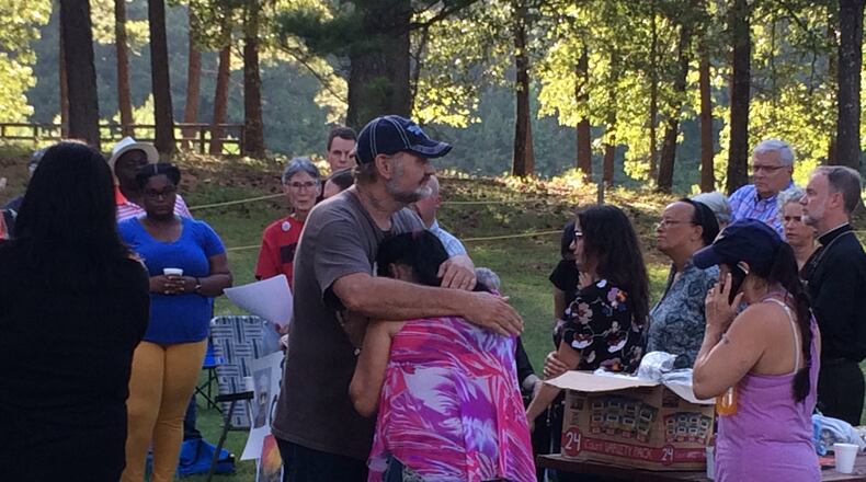 Friends and relatives of death row inmate John Wayne Conner gather Thursday evening, July 14, 2016, outside the Georgia Diagnostic and Classification Prison in Jackson, where the execution chamber is located. (Rhonda Cook/rcook@ajc.com)