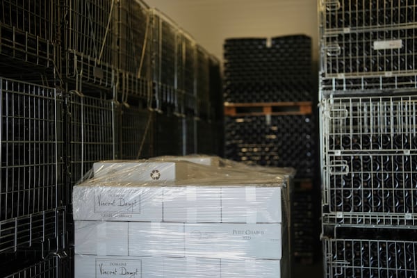 Bottles of Chablis wine are stored at the wine making facility of winegrower Vincent Dampt, in Chablis, Burgundy region, eastern France, Thursday, April 3, 2025. (AP Photo/Thibault Camus)