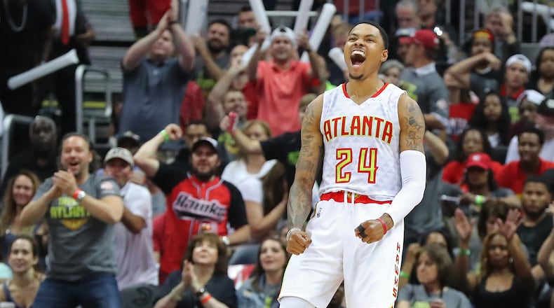 April 22, 2017, Atlanta: Atlanta Hawks Kent Bazemore and fans celebrate as he hits a three against the Washington Wizards on the way to a 116-98 victory in game 3 of a first-round NBA basketball playoff series on Saturday, April 22, 2017, in Atlanta.  Curtis Compton/ccompton@ajc.com