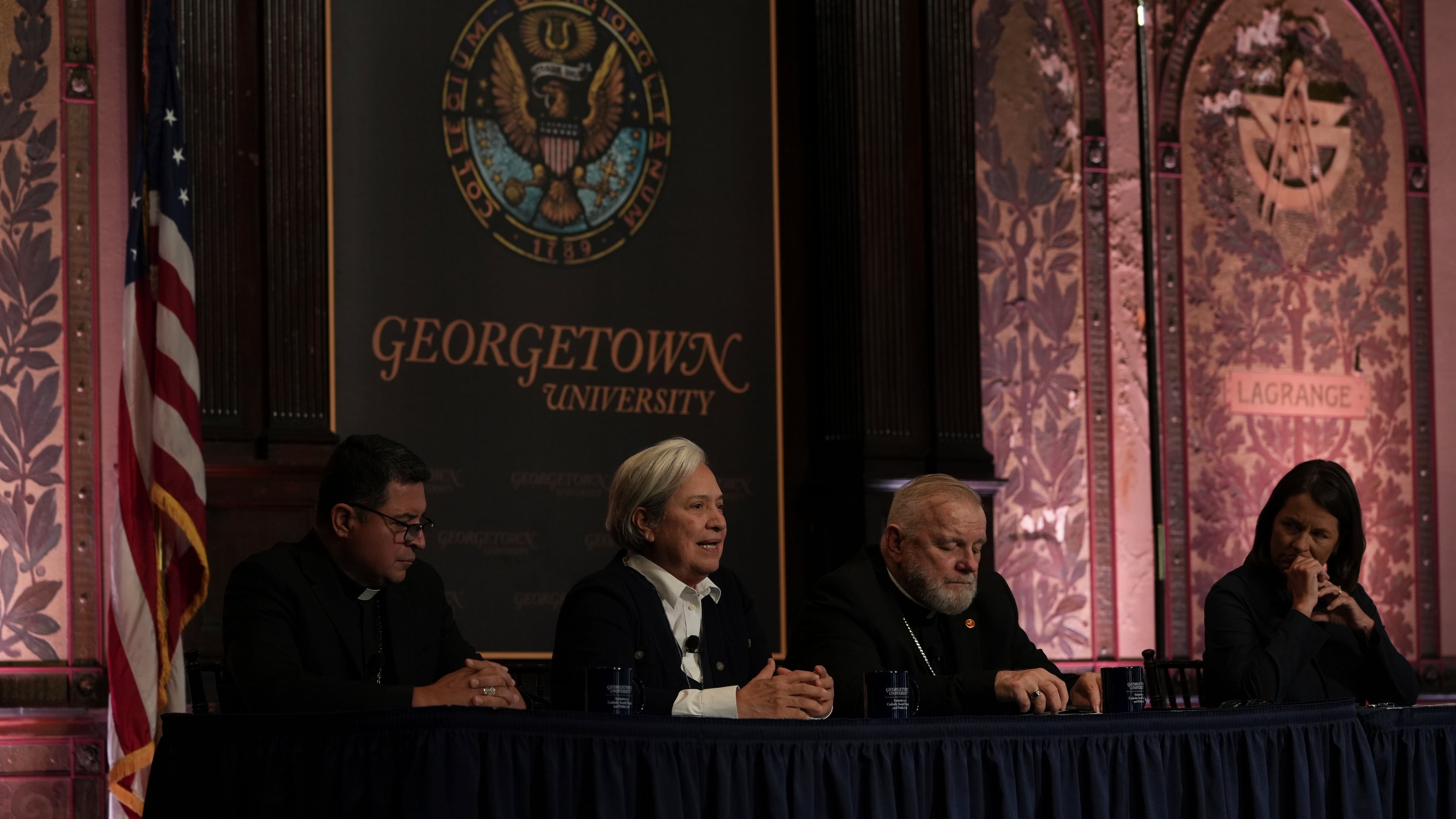 Sister Norma Pimentel (second left to right) speaks during a panel on the effects of the Trump administration's crackdown on immigrants held at Georgetown University in Washington, Thursday, Sept. 11, 2025. (AP Photo/Luis Andres Henao)