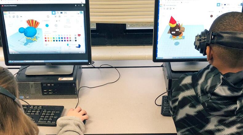 Oak Grove Elementary students in Peachtree City helped their teacher create designs for 3D printing. Courtesy Fayette County Public Schools