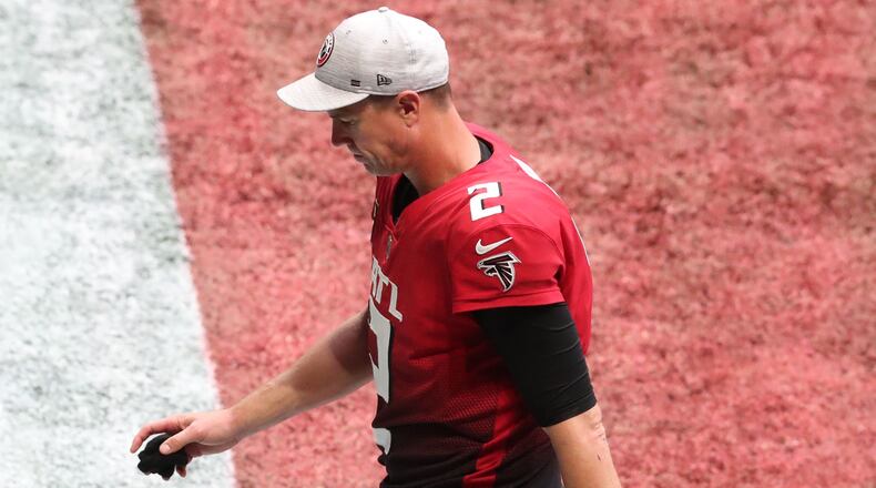 102520 Atlanta: Atlanta Falcons quarterback Matt Ryan walks off the field after falling 23-22 to the Detroit Lions Sunday, Oct. 25, 2020, at Mercedes-Benz Stadium in Atlanta. (Curtis Compton / Curtis.Compton@ajc.com)