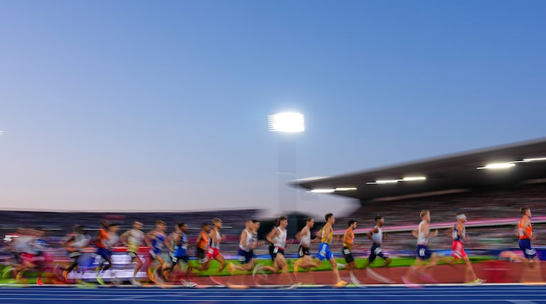 Athletes race in the men's 10,000 meters final at the European Athletics Championships in Birmingham, England, Saturday, Aug. 15, 2026. (AP Photo/Petr David Josek)