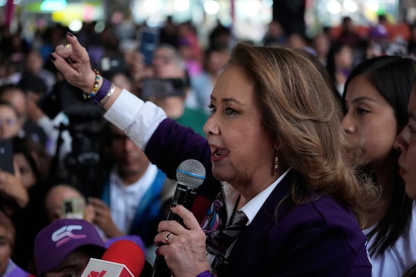 Yasmin Esquivel, who is running for election for the Mexican Supreme Court, greets supporters at her closing campaign rally in Mexico City, Wednesday, May 28, 2025. (AP Photo/Marco Ugarte)