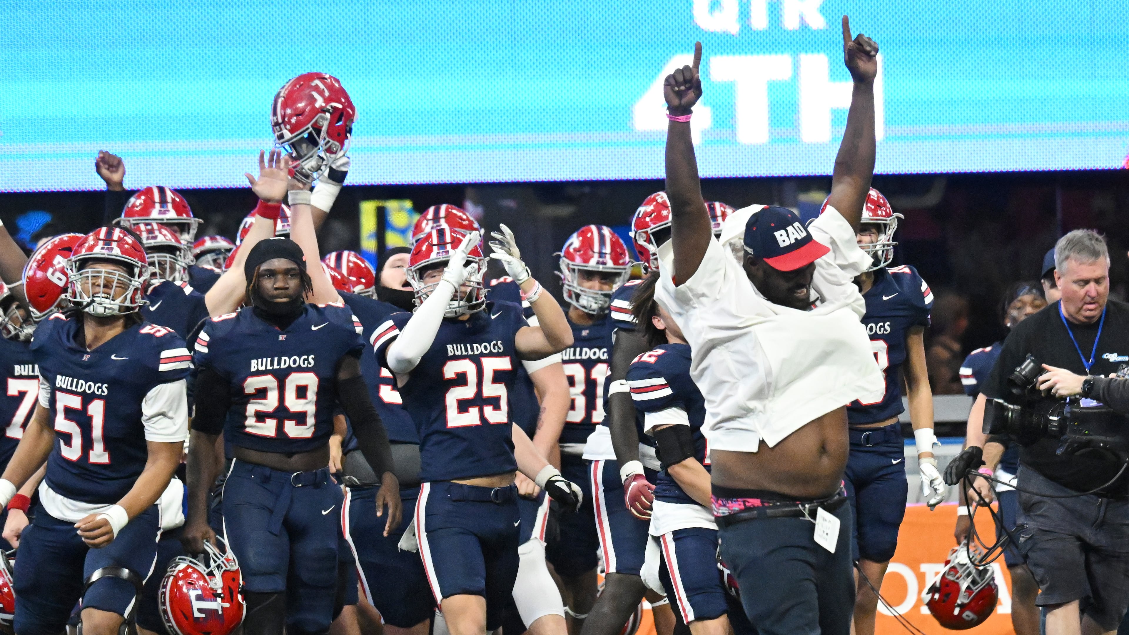 Toombs County players and coaching staff celebrate winning the GHSA Class A-Division State Championship on Dec. 17, 2024. (Hyosub Shin/AJC)