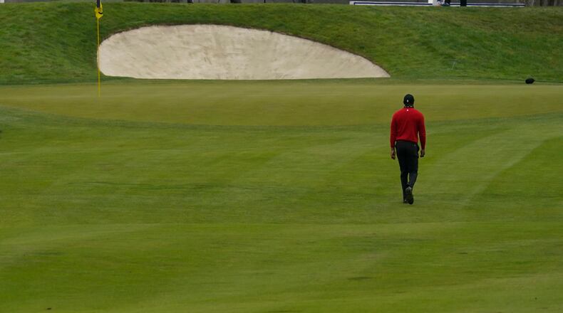 Tiger Woods walks down the 10th fairway during the final round of the PGA Championship at TPC Harding Park Sunday, Aug. 9, 2020, in San Francisco.