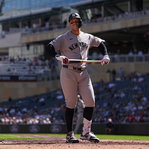 New York Yankees' Aaron Judge reacts after striking out during the third inning of a baseball game against the Minnesota Twins, Wednesday, Sept. 16, 2026, in Minneapolis. (AP Photo/Abbie Parr)
