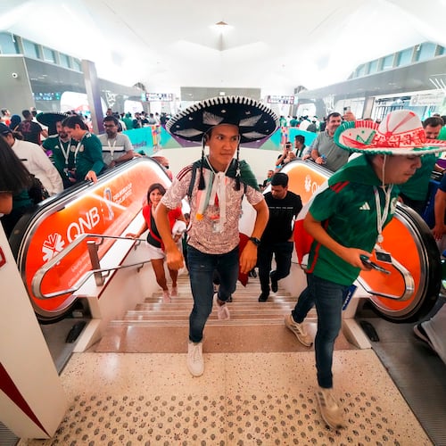FILE - Mexico soccer fans exit the metro station on their way to a World Cup group C soccer match between Saudi Arabia and Mexico, at the Lusail Stadium in Lusail, Qatar, Wednesday, Nov. 30, 2022. (AP Photo/Julio Cortez, File)