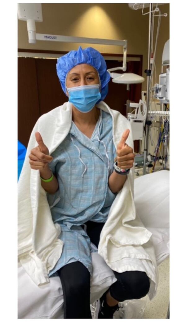 Sonia Ray gives a thumbs up after her breast cancer surgery. She started Harbor of Hope to support women with breast cancer living south of Atlanta. The nonprofit also has a support group just for Hispanic women. (Courtesy of Sonia Ray)