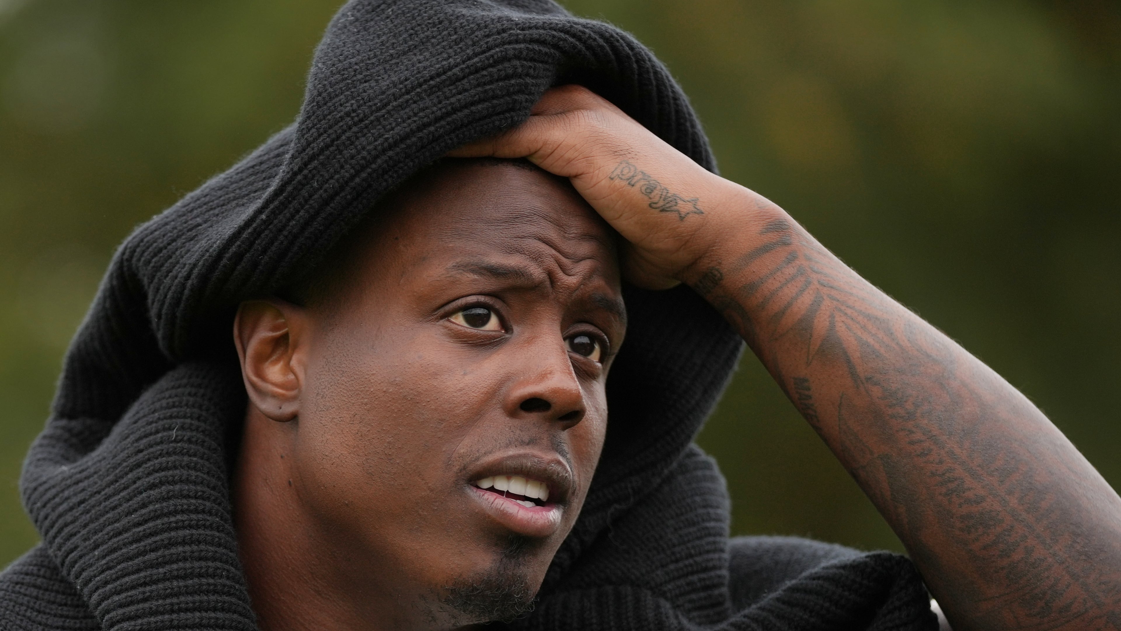 Jacksonville Jaguars running back Travis Etienne (1) speaks during an interview after an NFL football practice at The Grove in Watford, England, Friday, Oct. 17, 2025. (AP Photo/Kin Cheung)