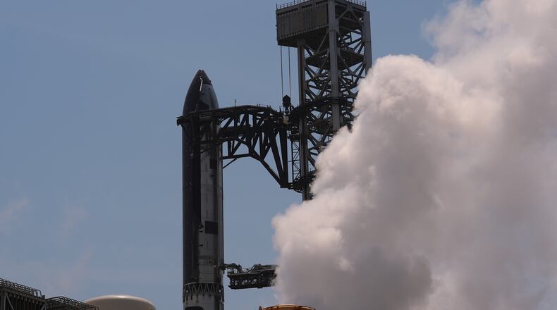 SpaceX's latest version of it's mega rocket Starship is prepared for a test flight from Starbase, Texas, Wednesday, May 20, 2026. (AP Photo/Eric Gay)