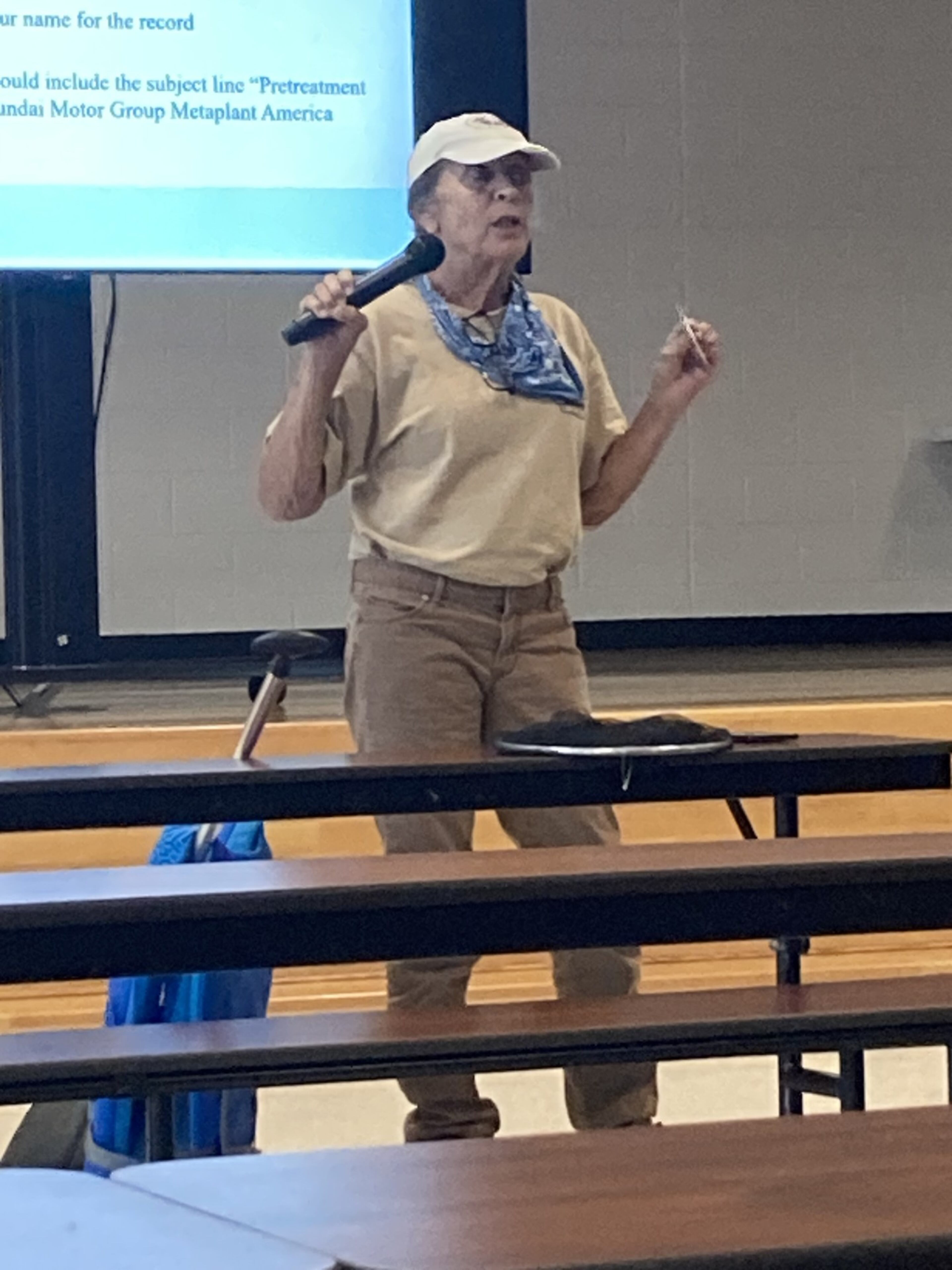 Connie Shreve speaks Thursday during a public hearing regarding a wastewater permit for the Hyundai electric vehicle factory. Shreve runs an outdoor adventures business on the Ogeechee River, into which the treated industrial waste will eventually be discharged. (Adam Van Brimmer/AJC)
