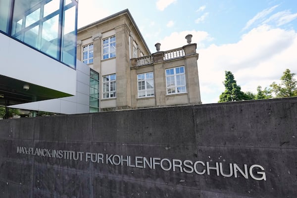 Modern and traditional architecture is seen at the Max Planck Institute for Coal Research in Muelheim, Germany, Friday, May 23, 2025. (AP Photo/Martin Meissner)