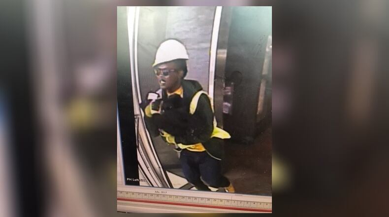 DeKalb County police and FBI officials are searching for a man they say threw hot coffee on an armored truck courier. (Credit: FBI Atlanta)