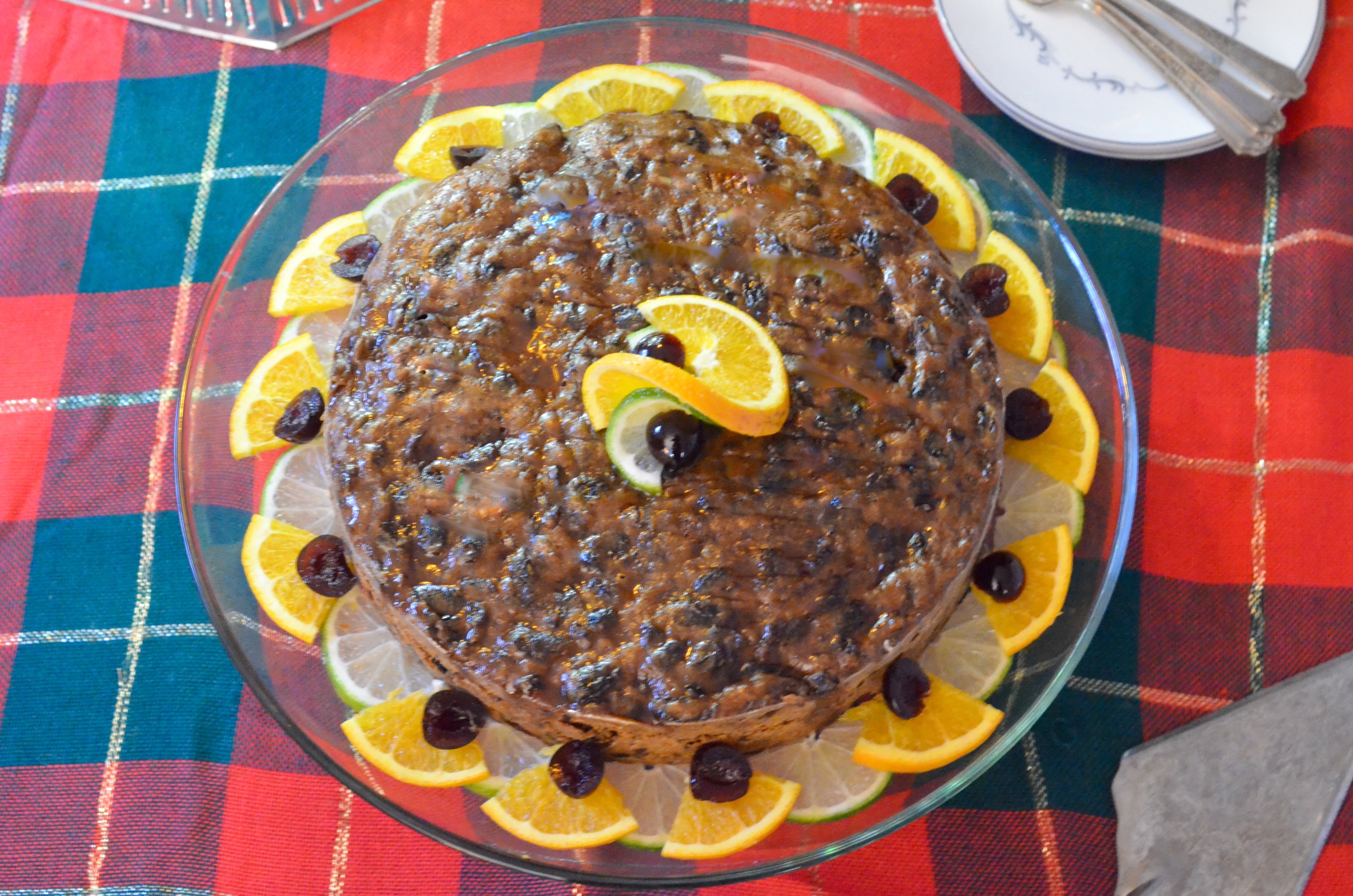 Caribbean black cake is intensely flavored with warm spices and dark in color from a melange of alcohol-soaked fruit. (Virginia Willis for The Atlanta Journal-Constitution)