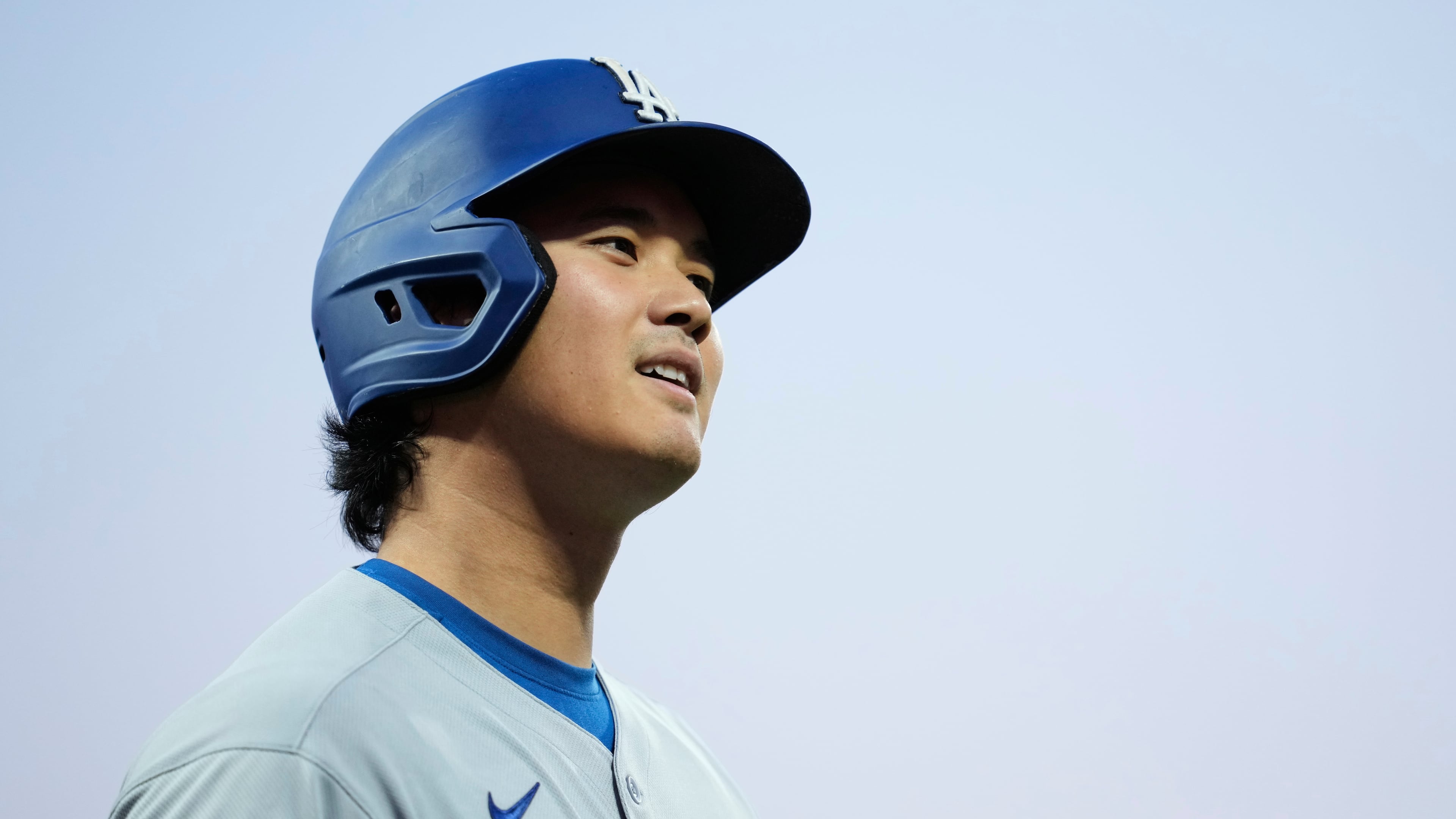 Los Angeles Dodgers' Shohei Ohtani walks to the dugout after being called out on strikes during the fourth inning of a baseball game against the San Francisco Giants, Saturday, Sept. 13, 2025, in San Francisco. (AP Photo/Godofredo A. Vásquez)