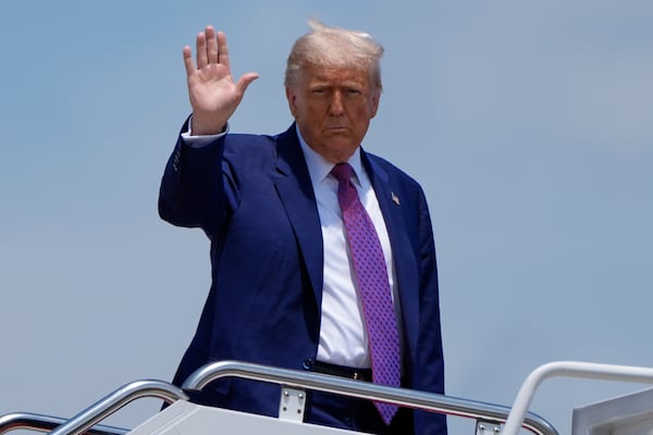 President Donald Trump waves as he boards Air Force One, Tuesday, June 10, 2025, at Joint Base Andrews, Md. (AP Photo/Alex Brandon)