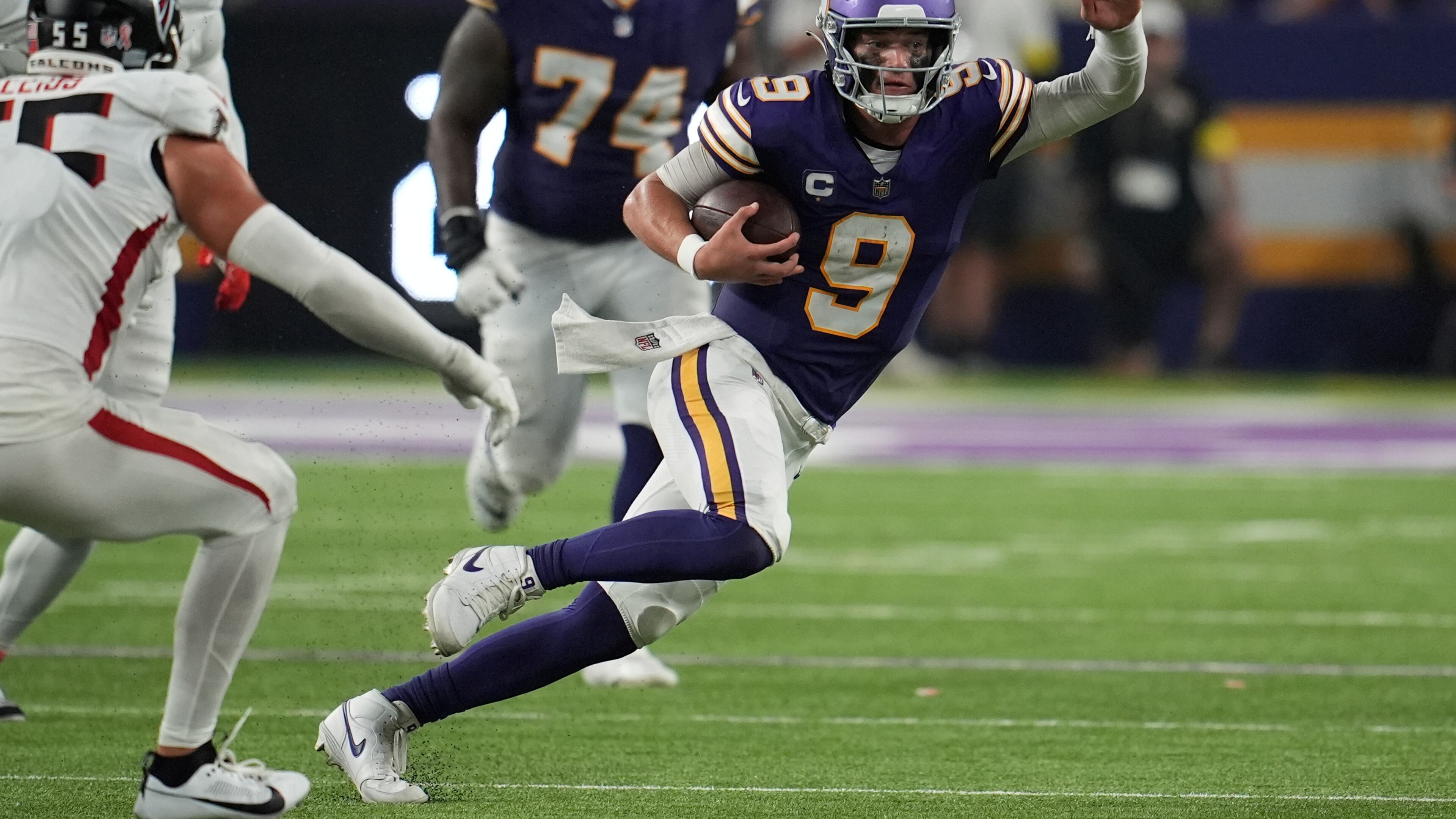 Minnesota Vikings quarterback J.J. McCarthy (9) runs the ball during the second half of an NFL football game against the Atlanta Falcons, Sunday, Sept. 14, 2025, in Minneapolis. (AP Photo/Mike Stewart)